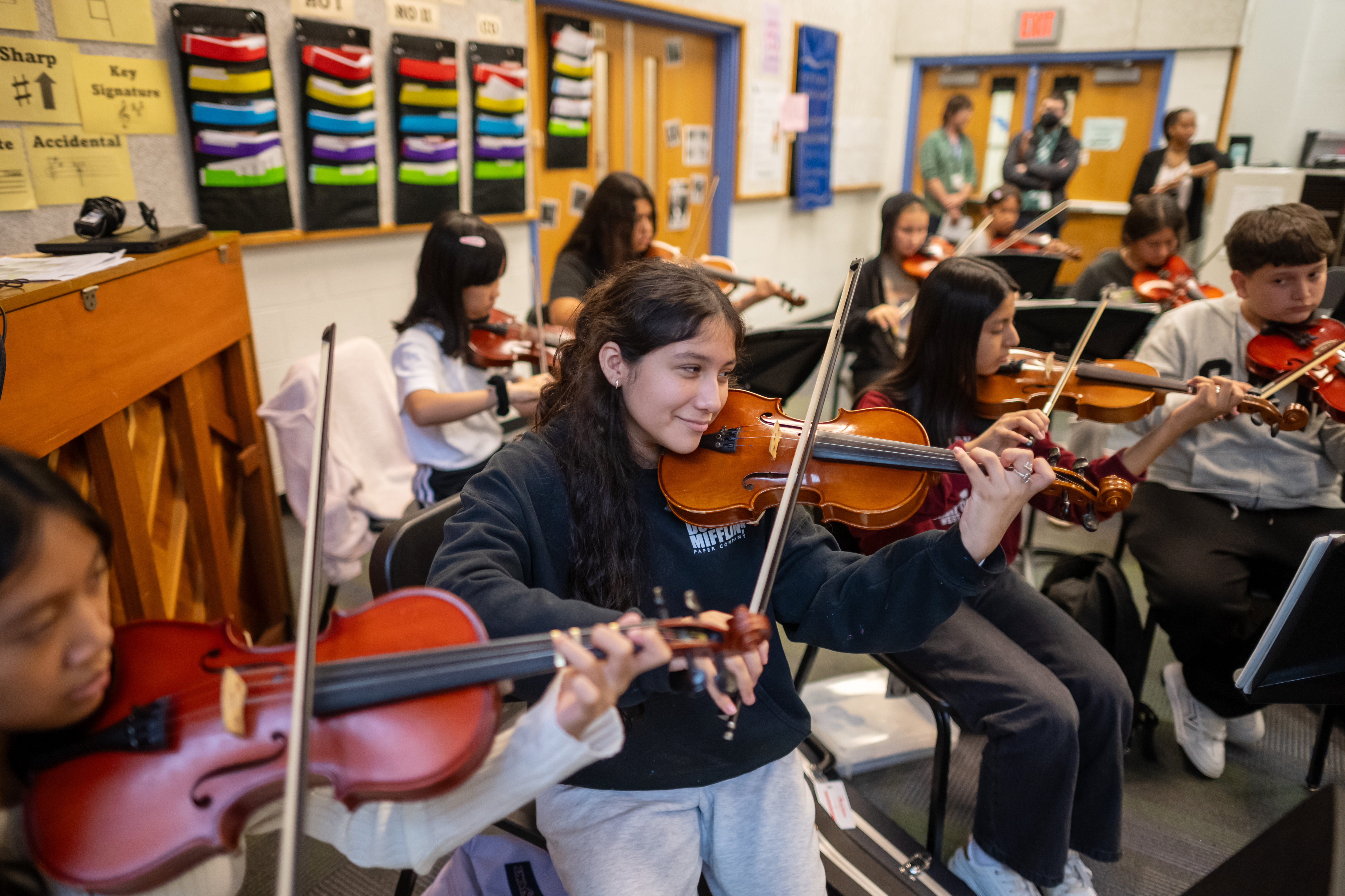 Orchestra students rehearsing